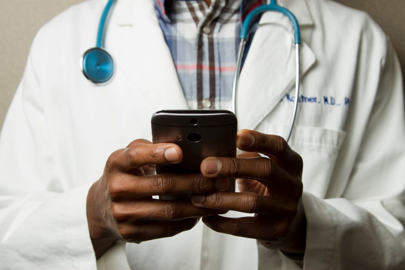 Clinician reviewing lab results on a tablet